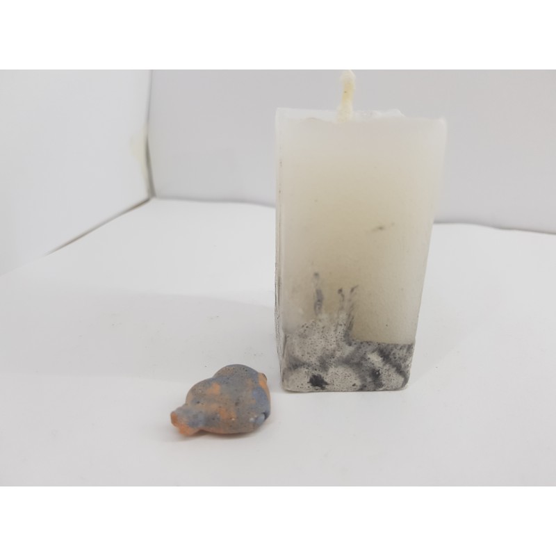 Litle rectangular handmade candle made of concrete, white with black