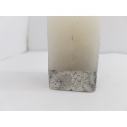 Litle rectangular handmade candle made of concrete, white with black