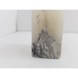 Litle rectangular handmade candle made of concrete, white with black