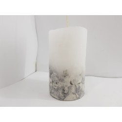 Handmade oval candle made of concrete, white with black