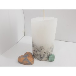 Handmade oval candle made of concrete, white with black