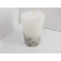 Handmade oval candle made of concrete, white with black