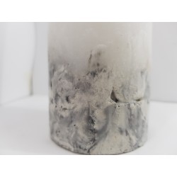 Handmade oval candle made of concrete, white with black