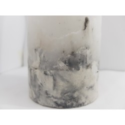 Handmade oval candle made of concrete, white with black