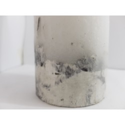 Handmade oval candle made of concrete, white with black