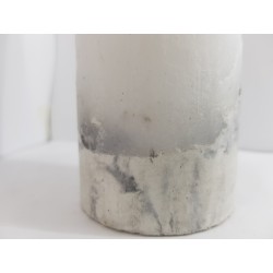 Handmade oval candle made of concrete, white with black