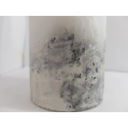 Handmade oval candle made of concrete, white with black